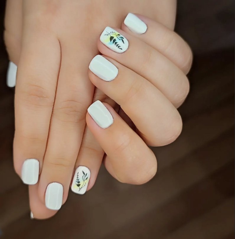 Chic Floral Accents for White Nails