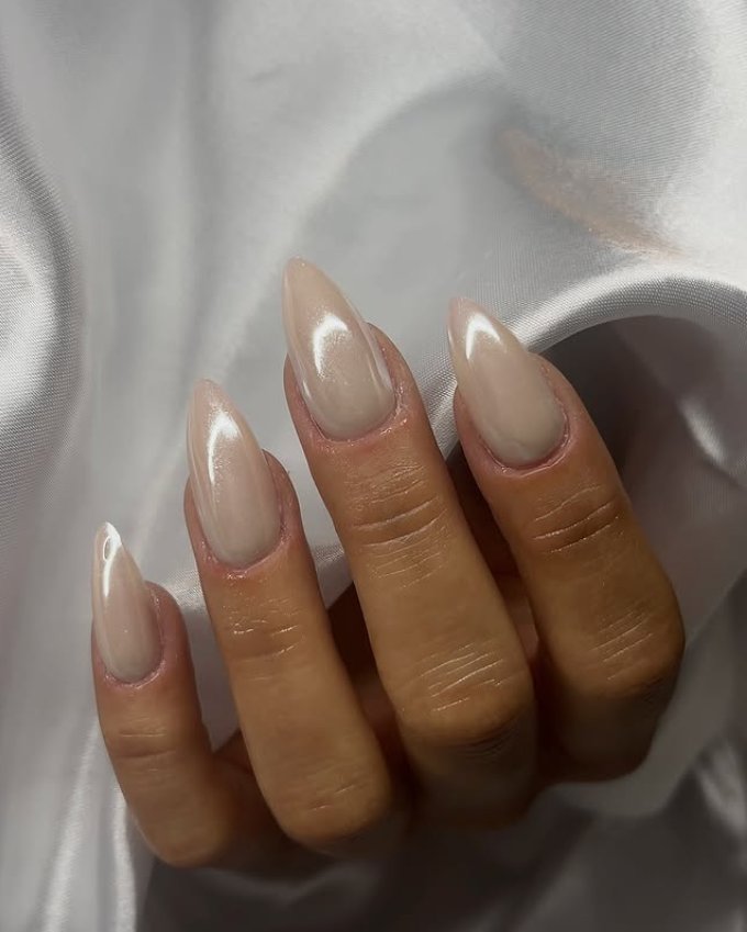 Elegant Glazed Nude Almond Nail Design