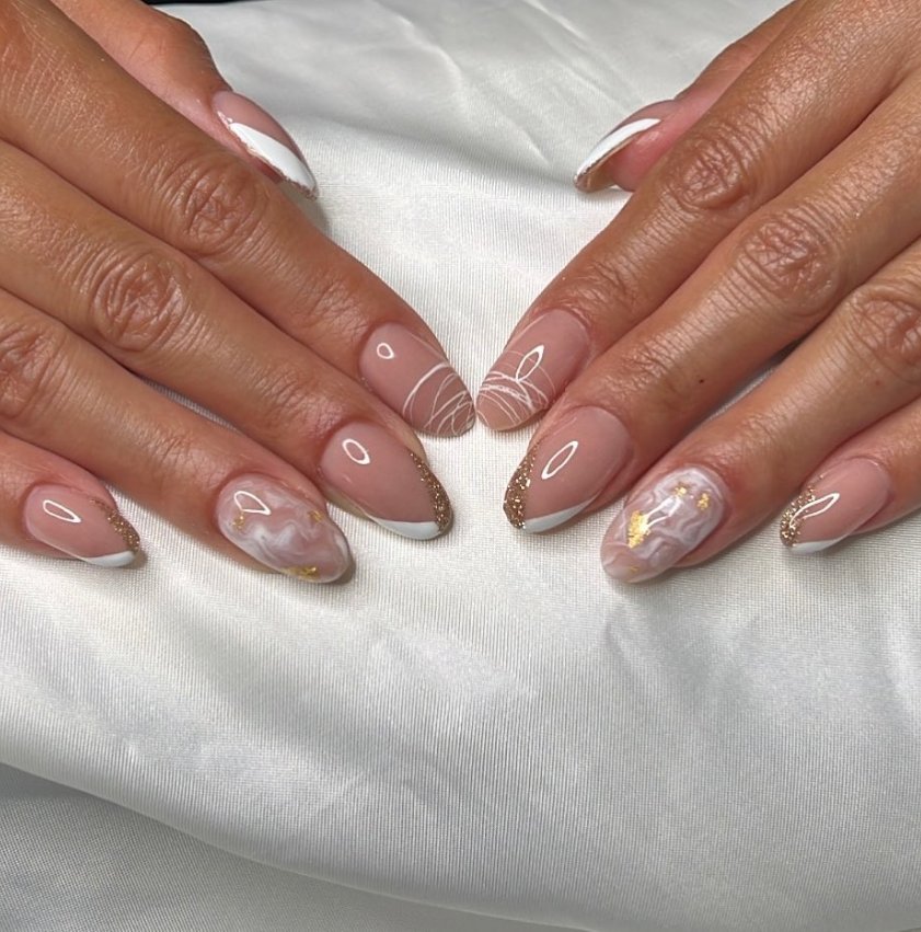 Elegant Nude Almond Nails with Accents