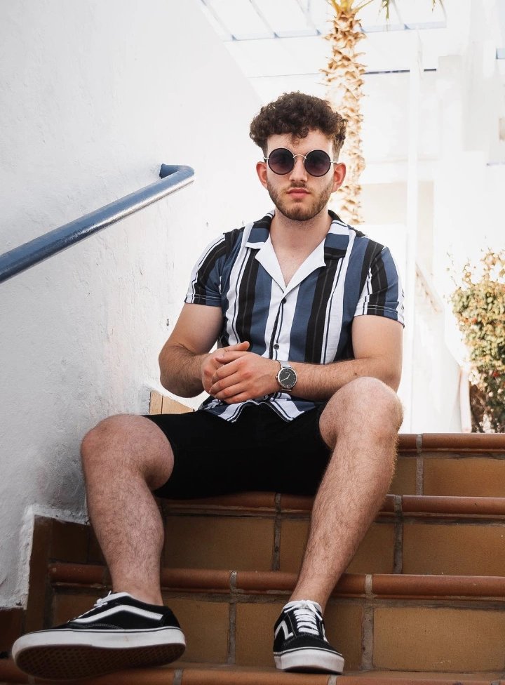 Black Shorts and Striped Shirt