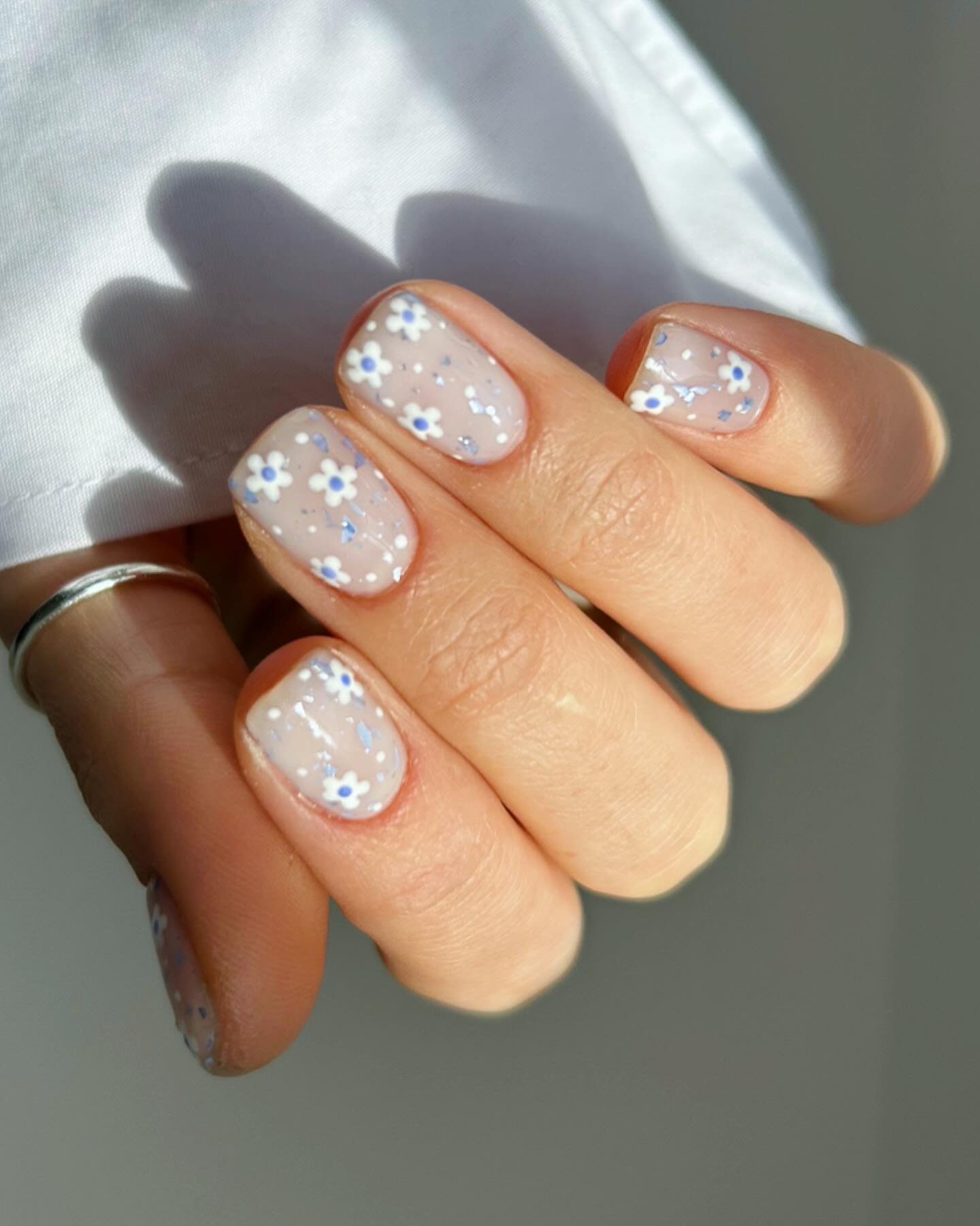 Blue and White Flower Nails
