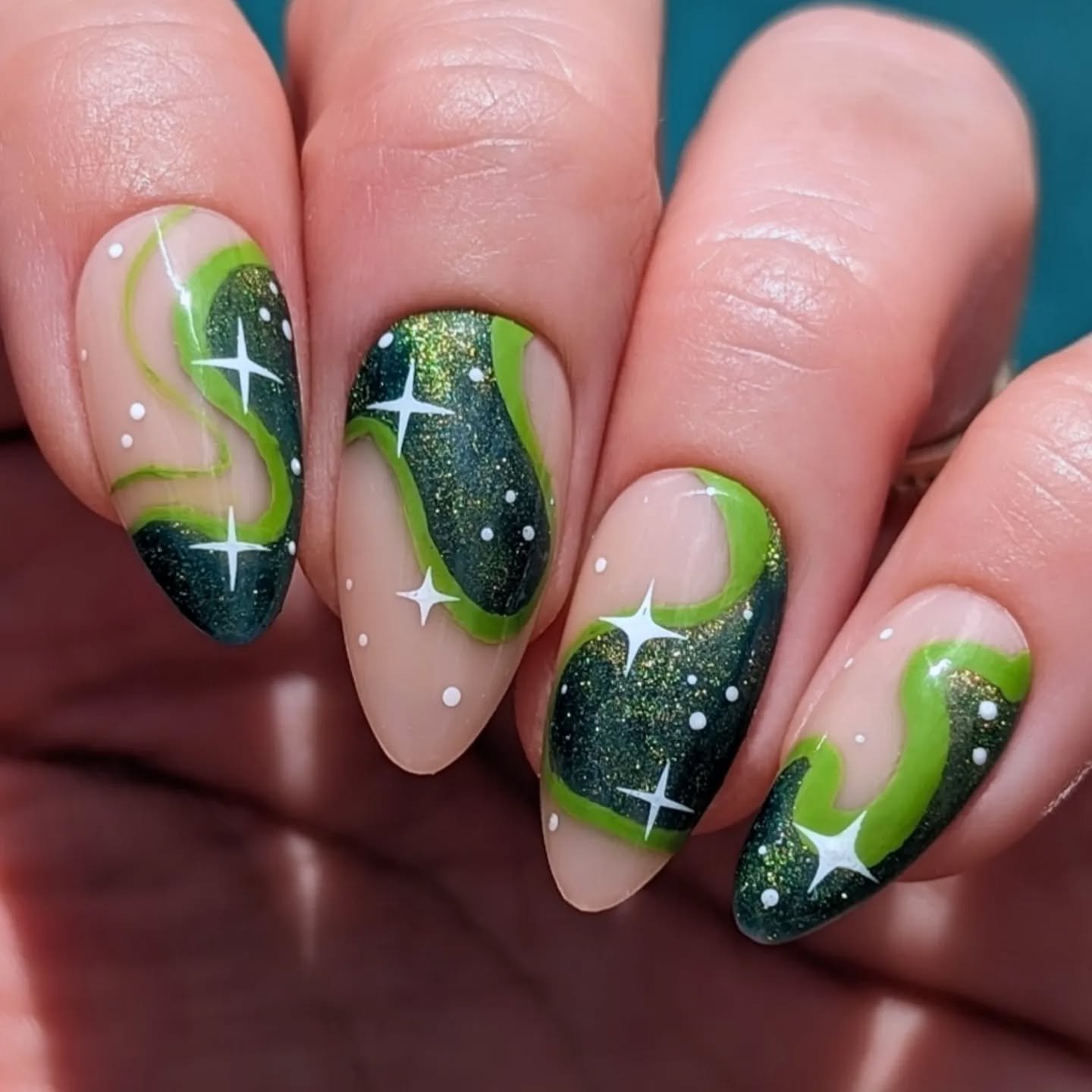 Galaxy-Inspired Green Manicure