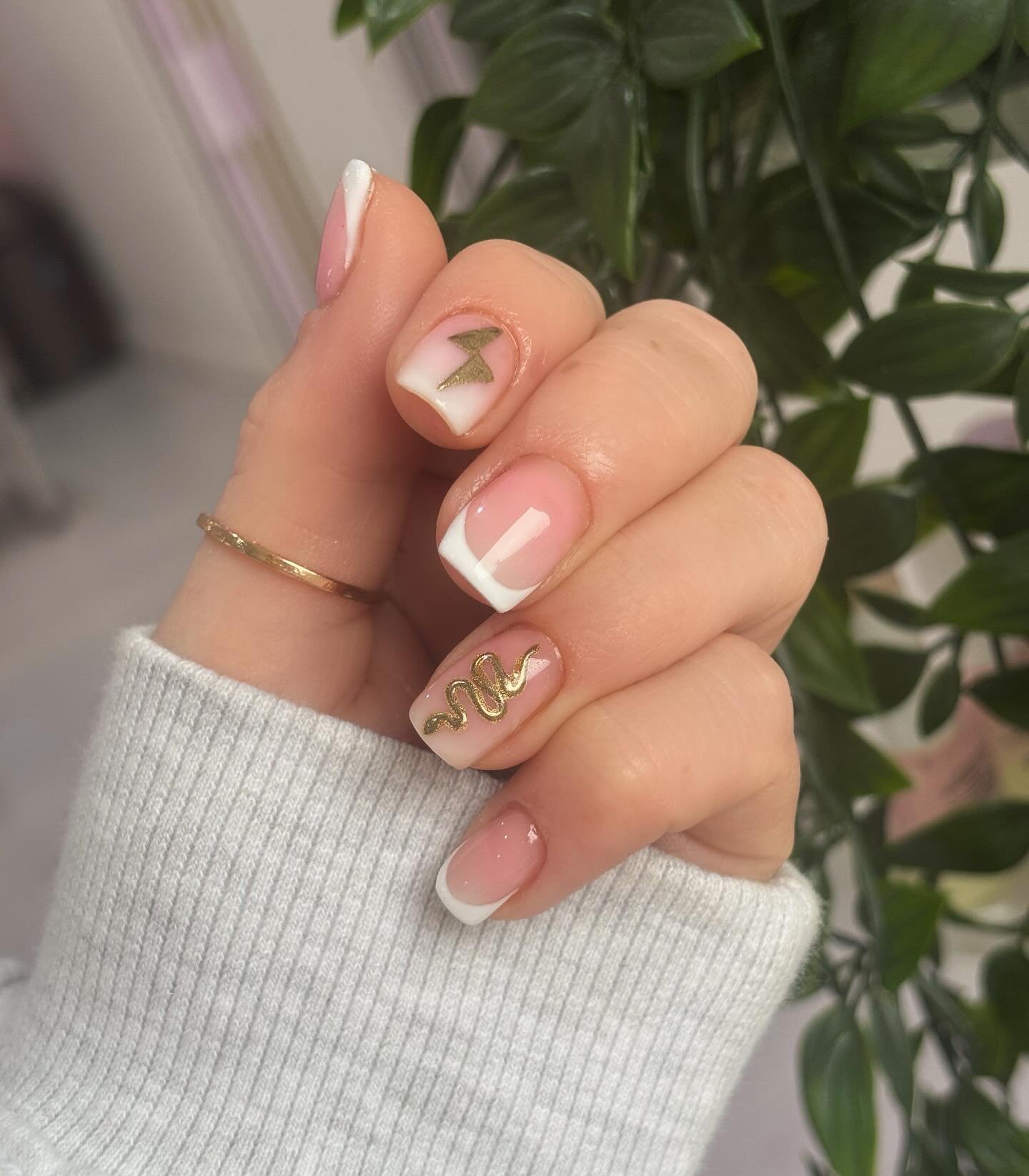 Gold Snake Nail Design