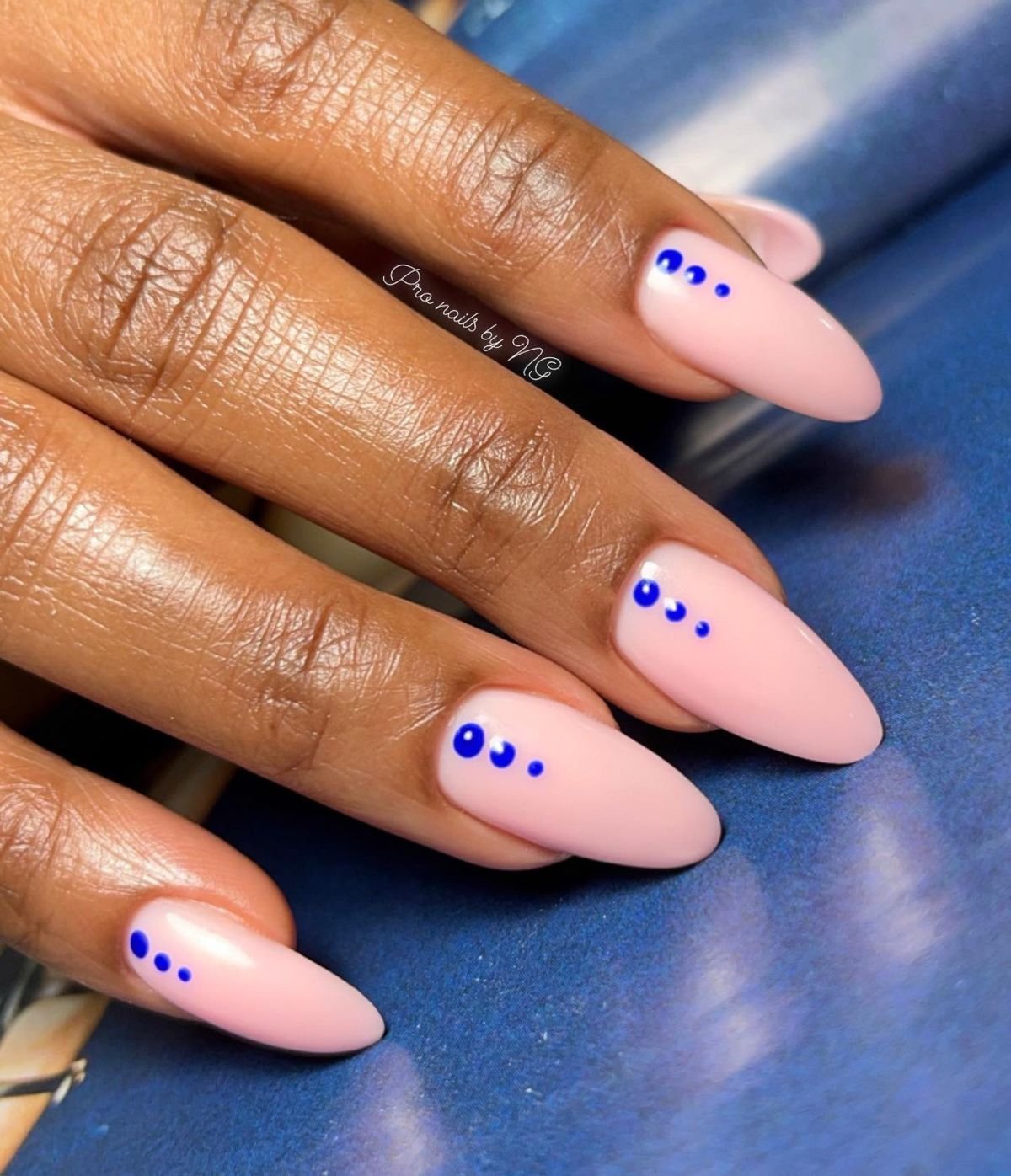 Pink Manicure with Blue Dots