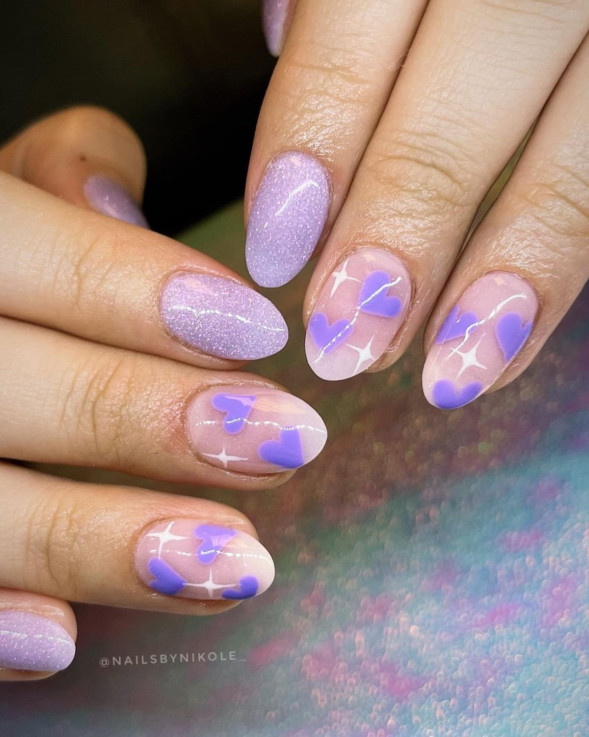 Swirling Purple Nail Design