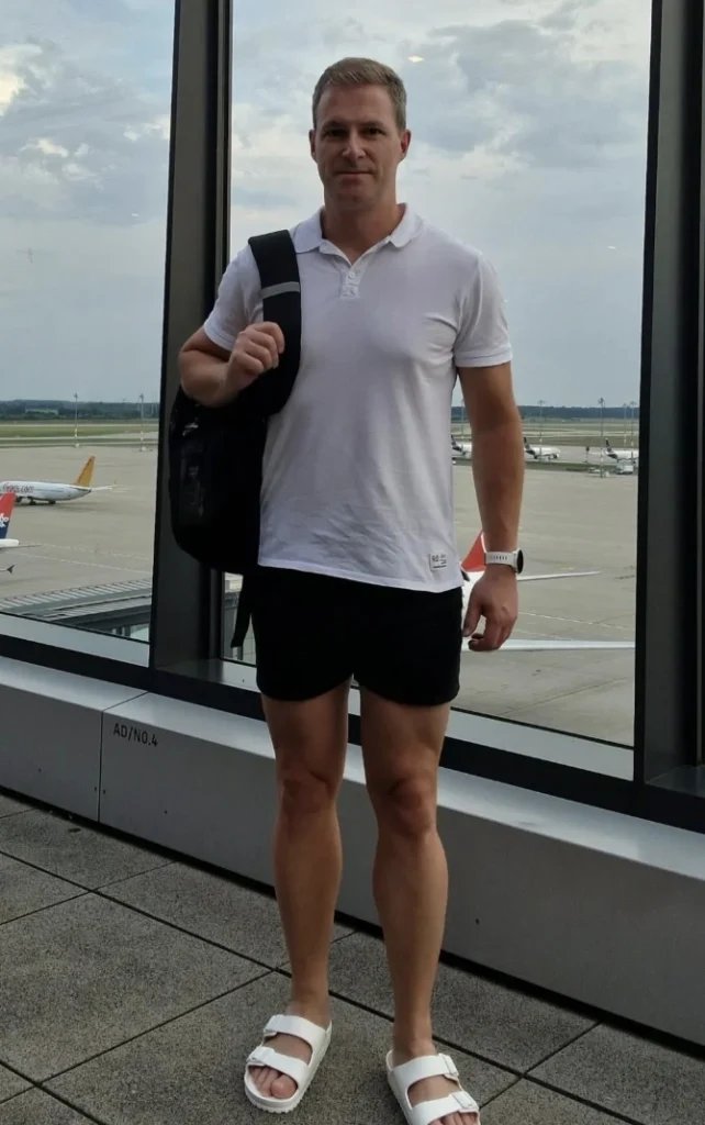 White Polo with Black Shorts