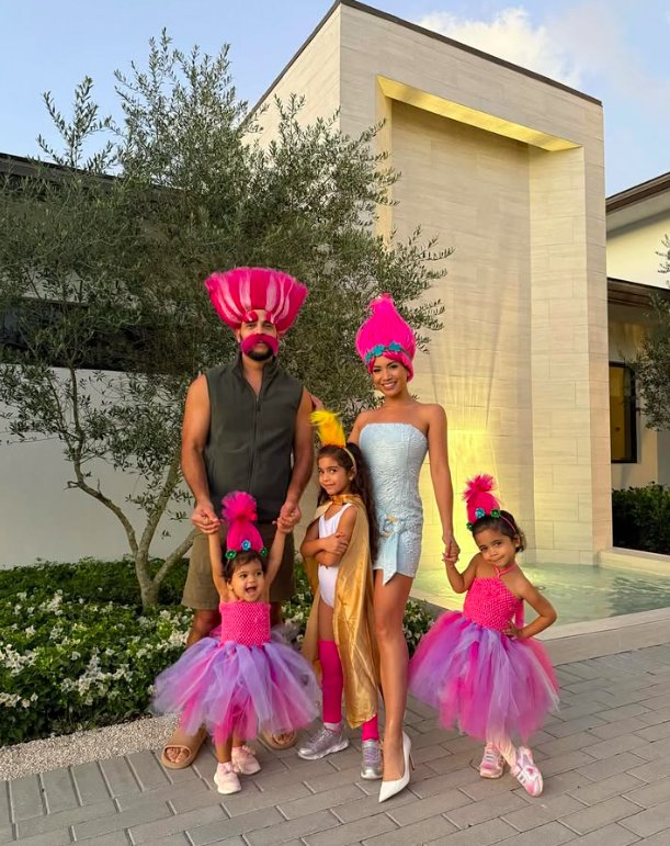 Colorful Troll Family Costumes with Pink Hair