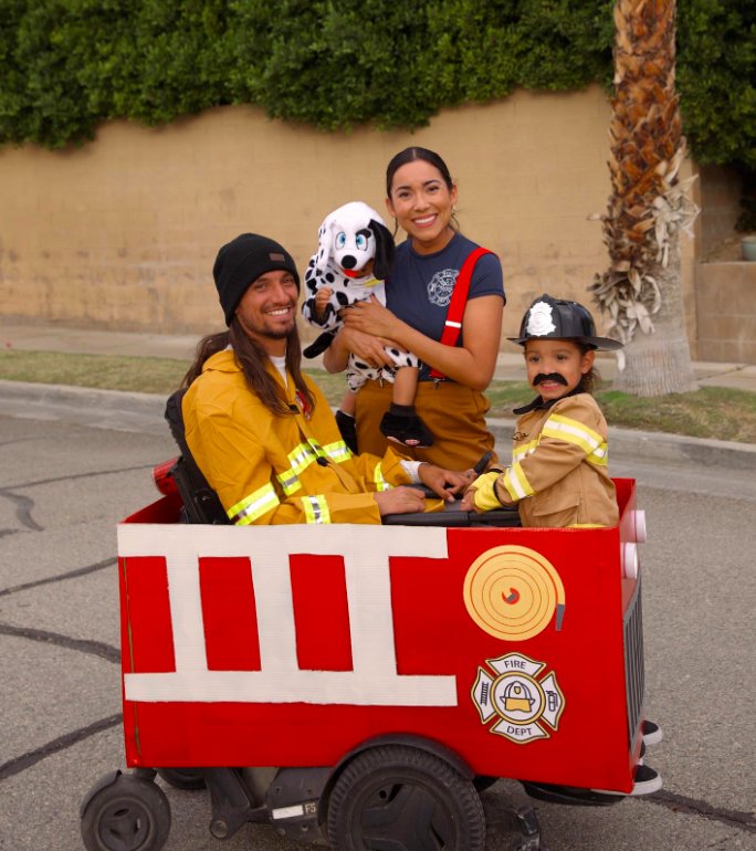 Family Firefighter Costumes with Cardboard Fire Truck