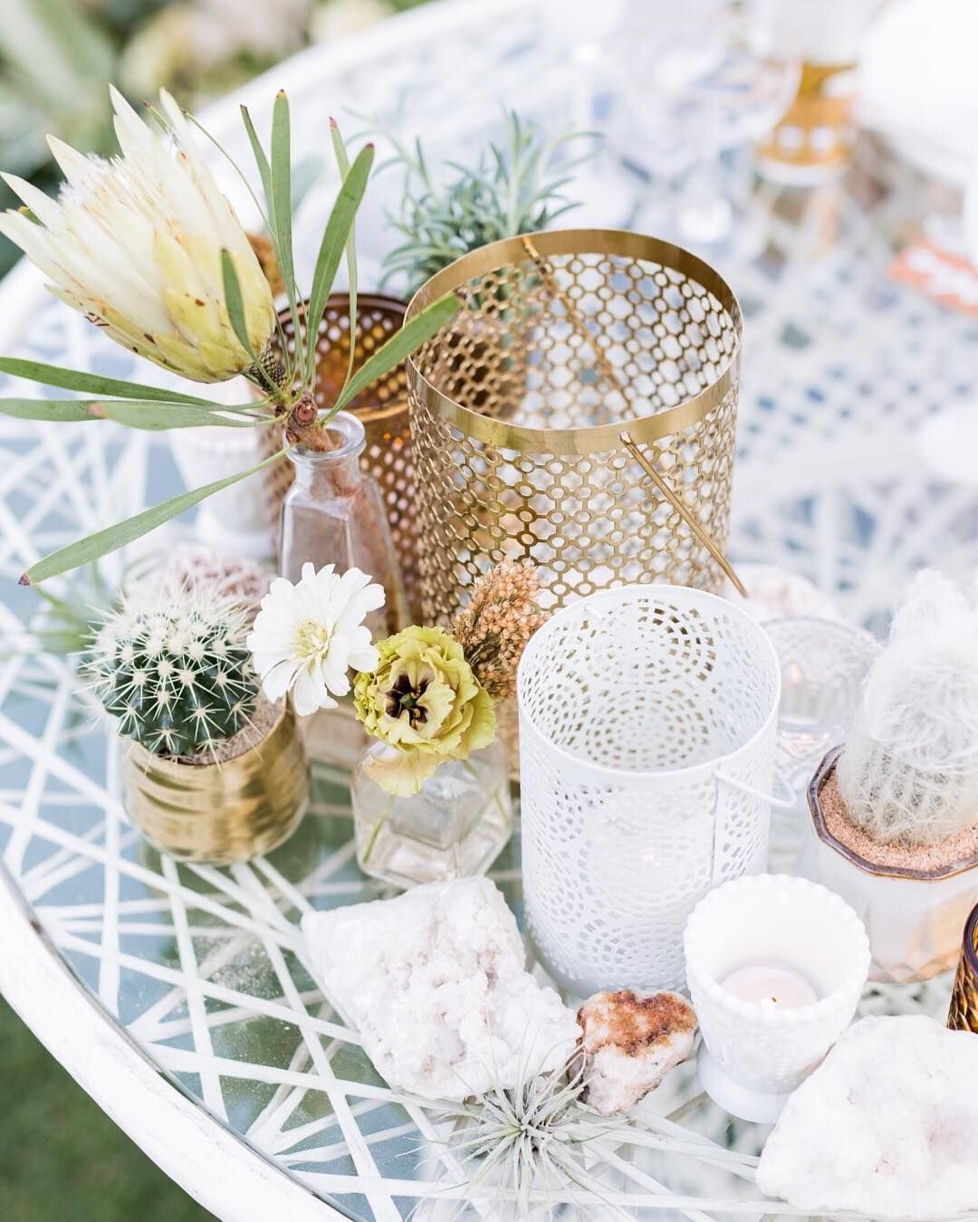 Gold, White, and Clear Vases