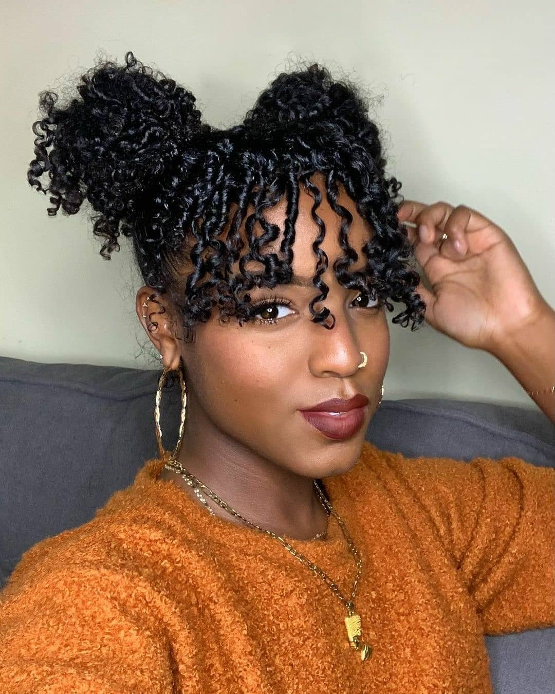 Double Bun Coil Bangs