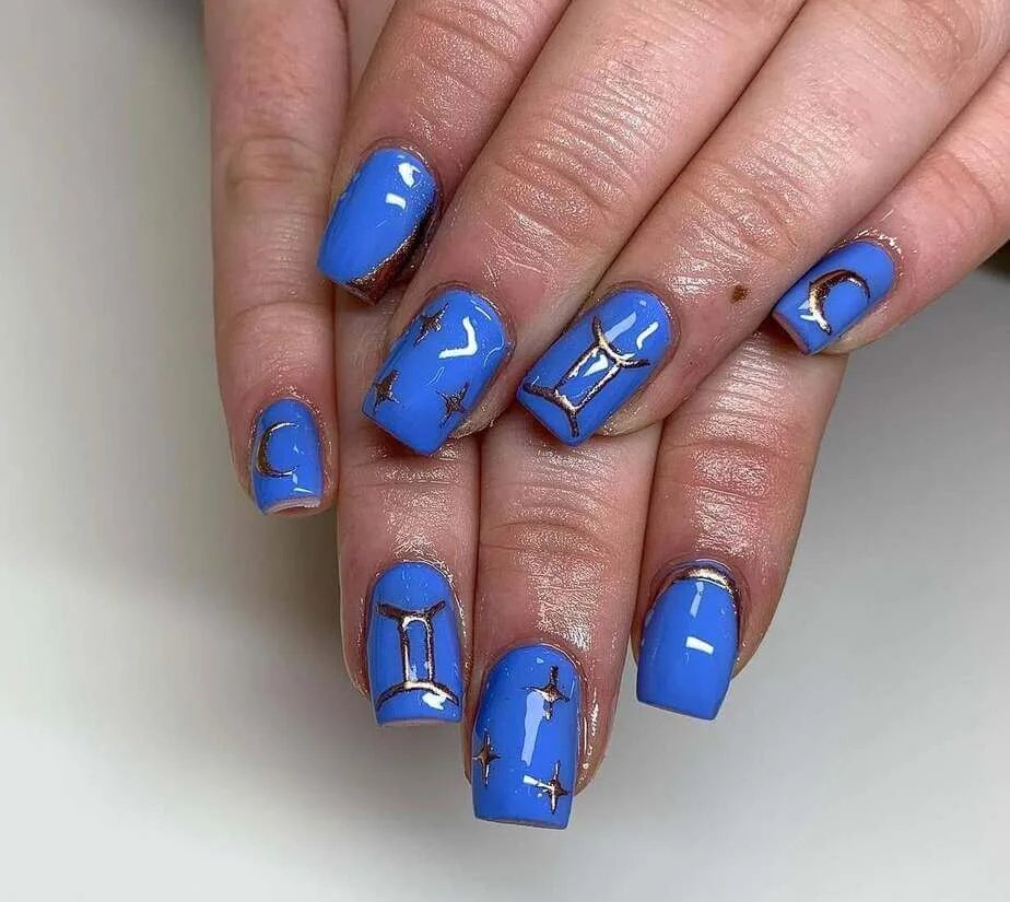 Bold Blue Zodiac Nails