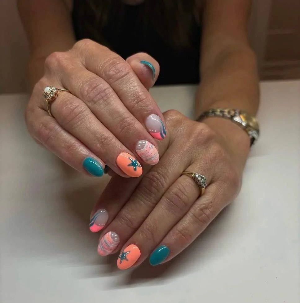 Coral and teal summer nails