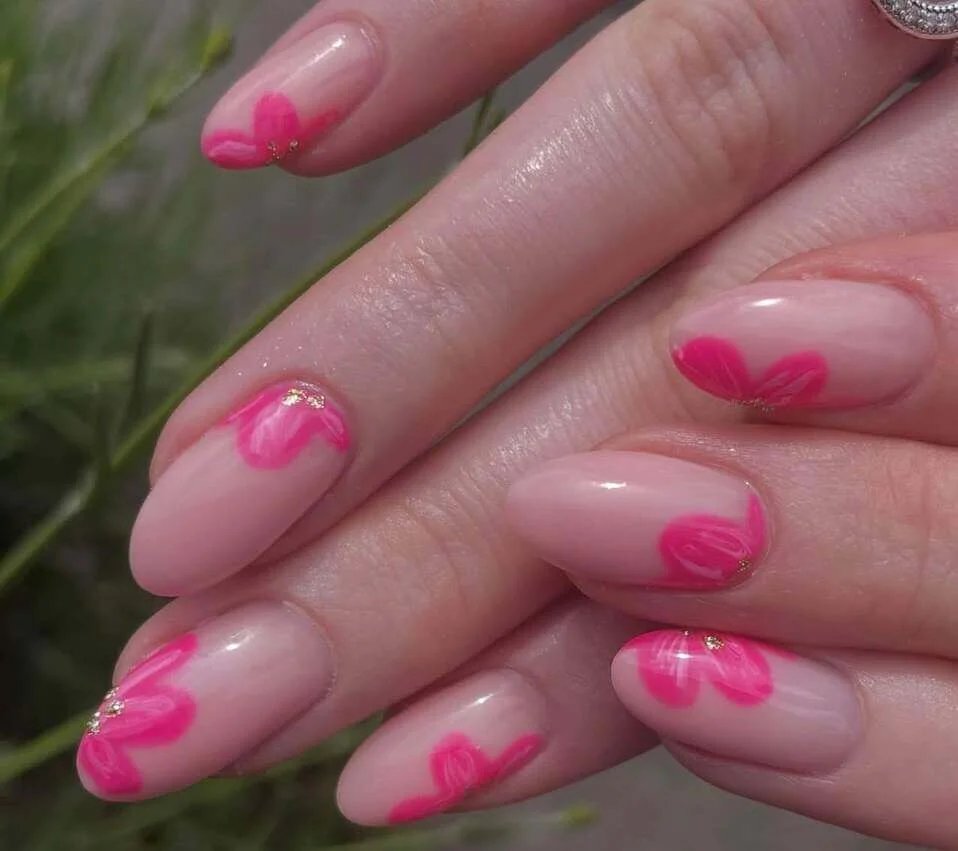 Hot pink petals with gold accents