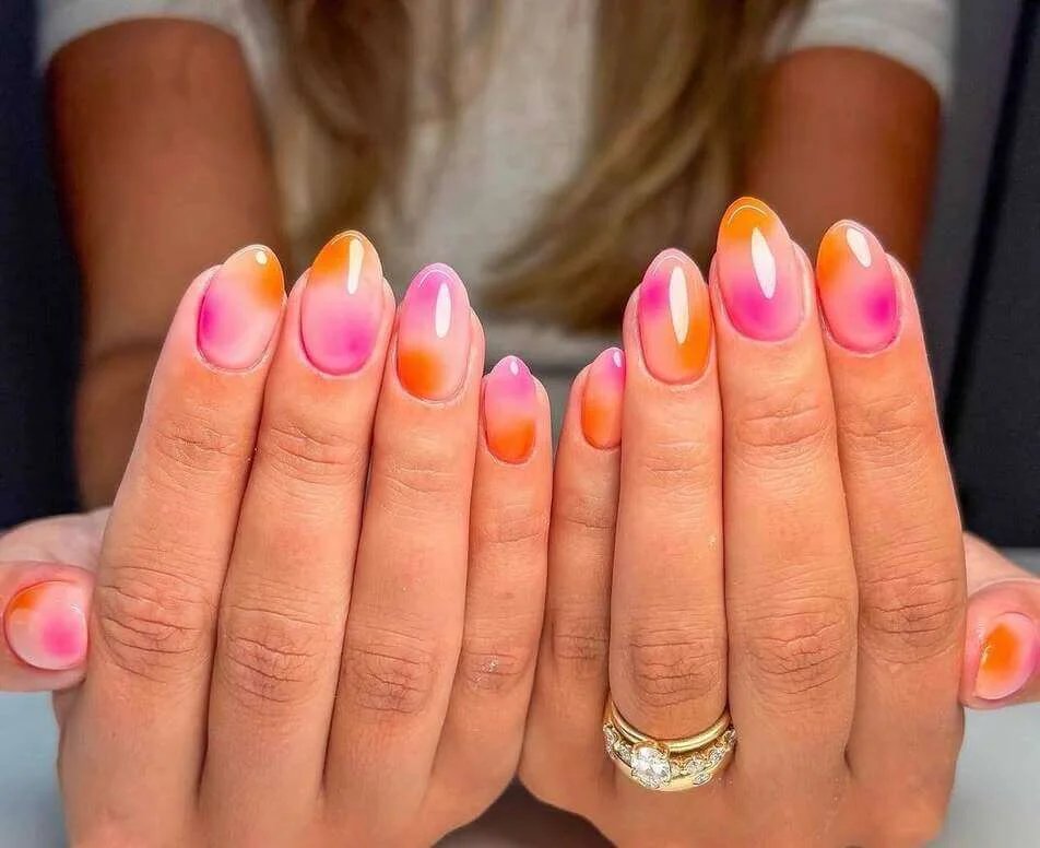 Pink orange glow nails