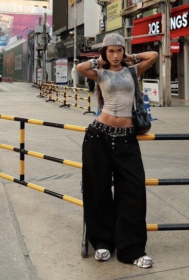 Washed grey top, layered belts
