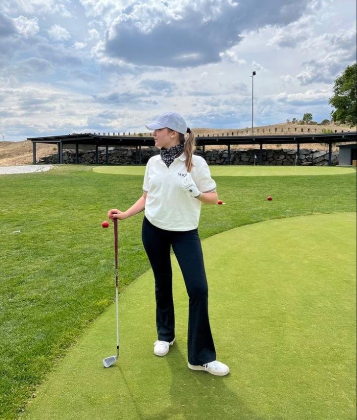 White polo, flared pants