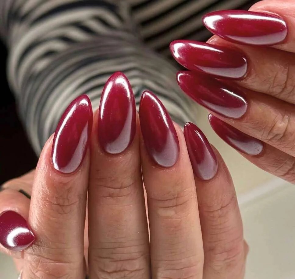 Glossy Maroon Almond Nails