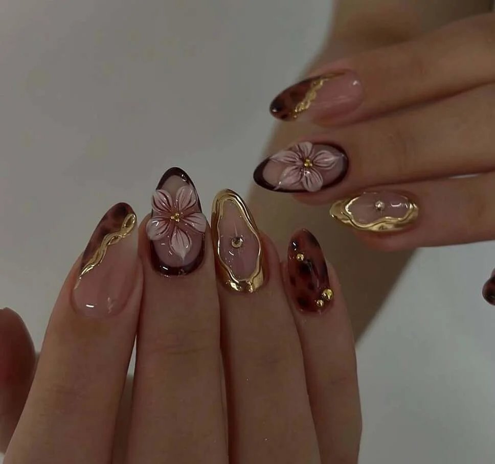 Gold tortoiseshell floral nails