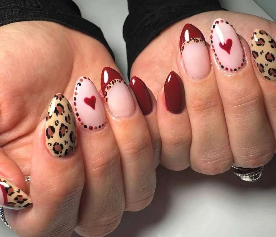 Maroon leopard nails