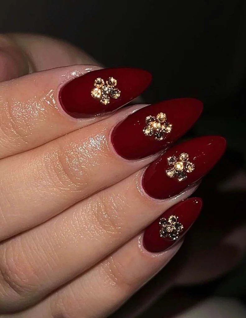 Maroon nails with gold florals