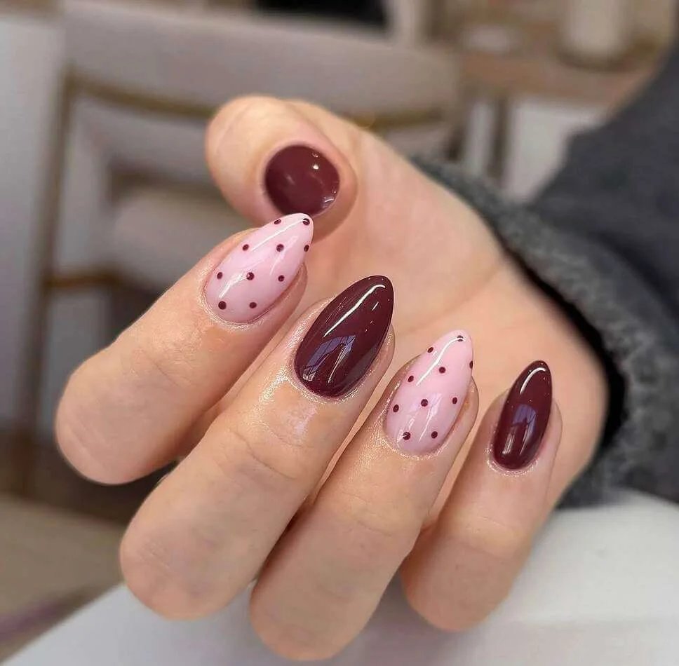 Maroon polka dot nails