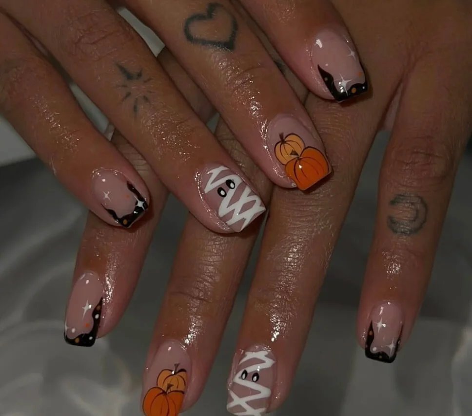 Mummy and pumpkin nail art