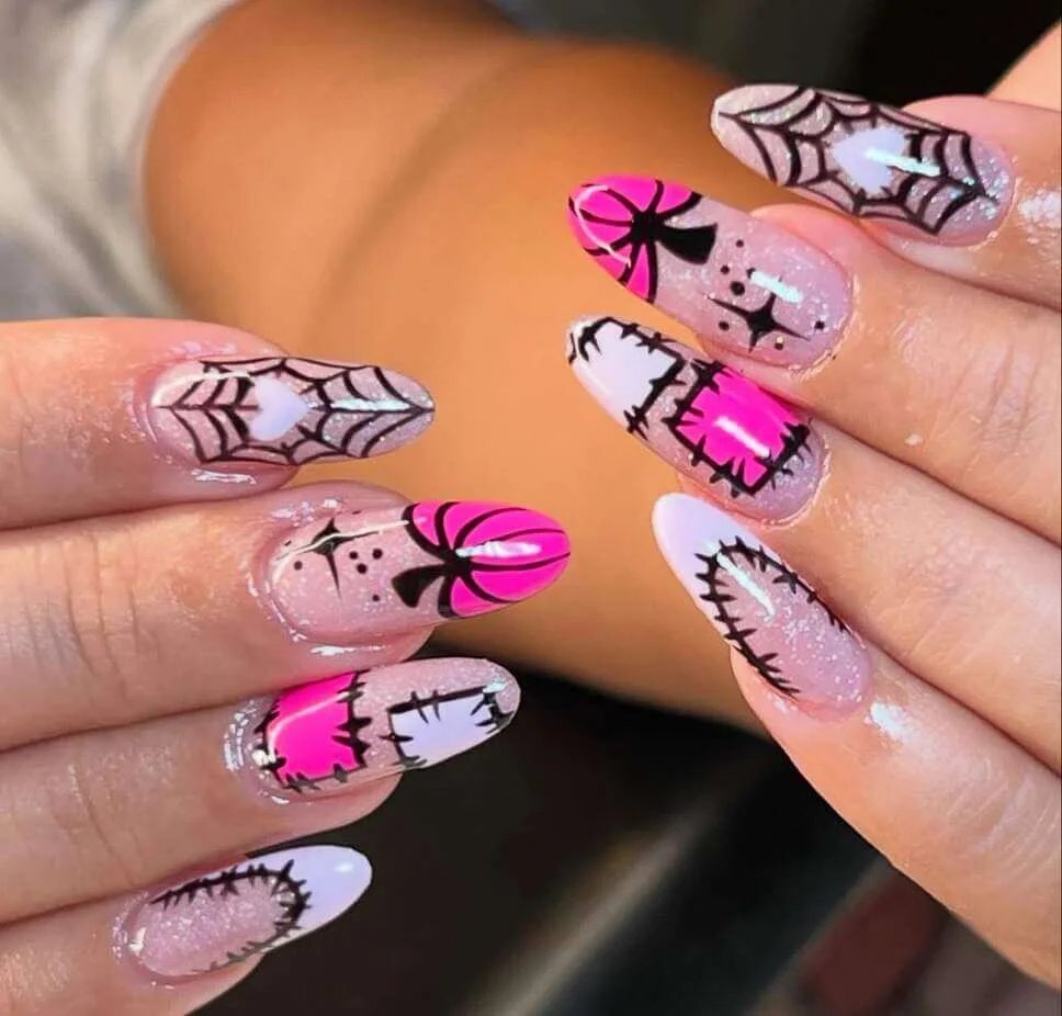 Pink spiderweb stitched nails