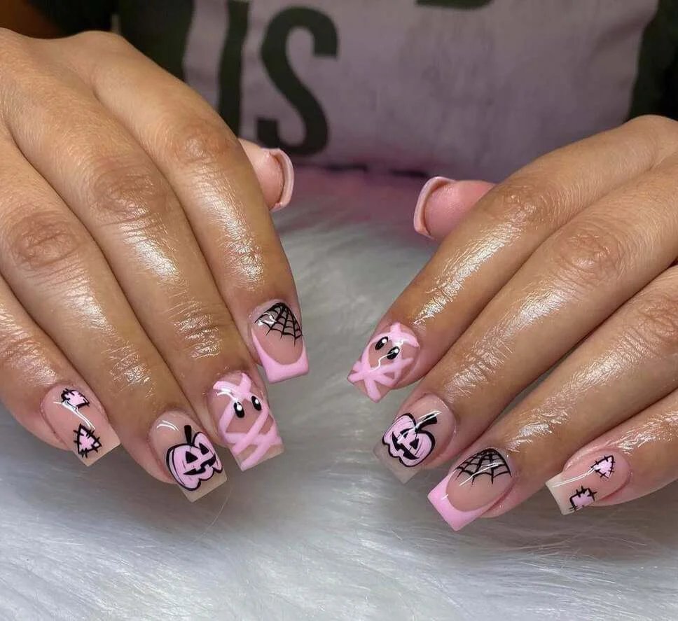 Pink square nails with pumpkins