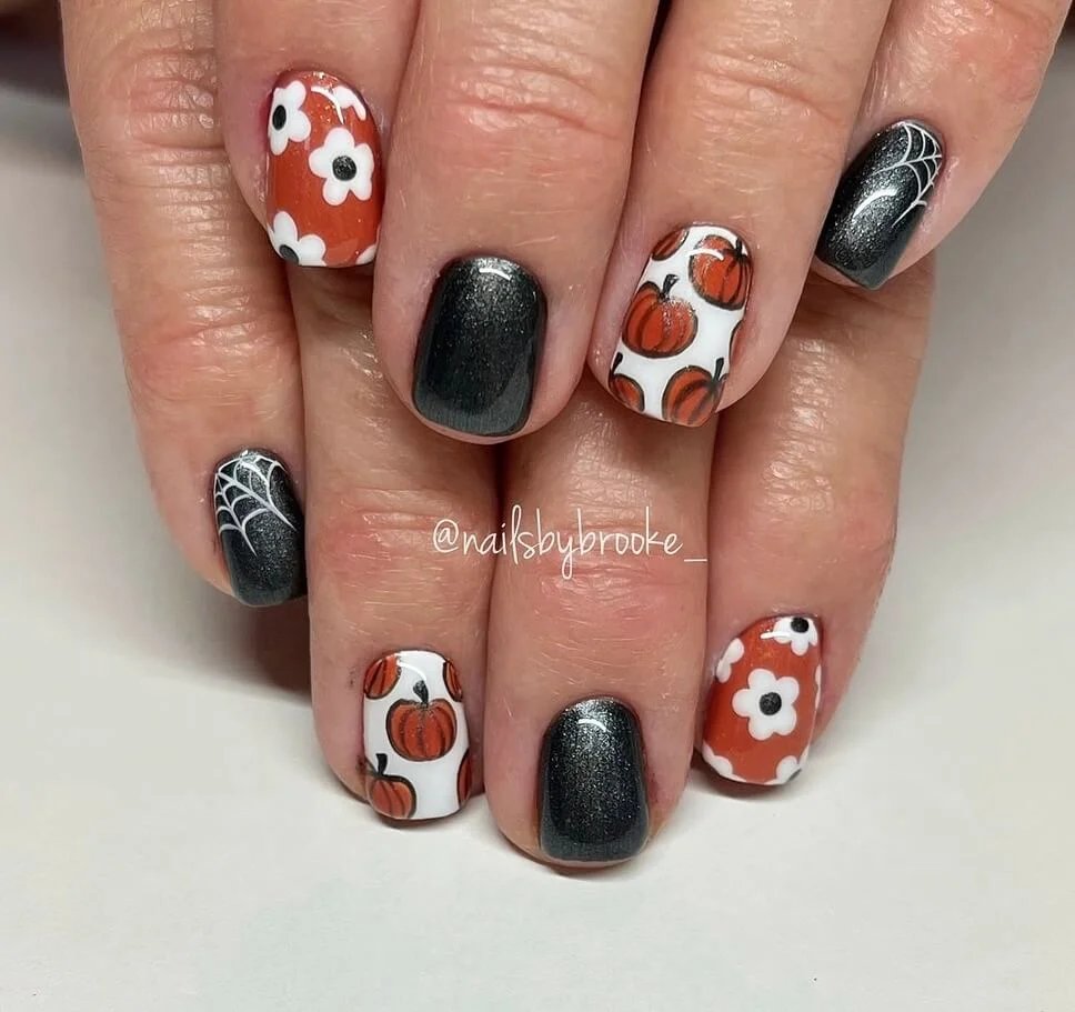 Pumpkin floral spiderweb nails