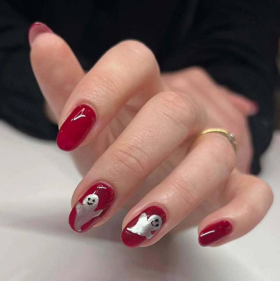 Red nails with silver ghosts