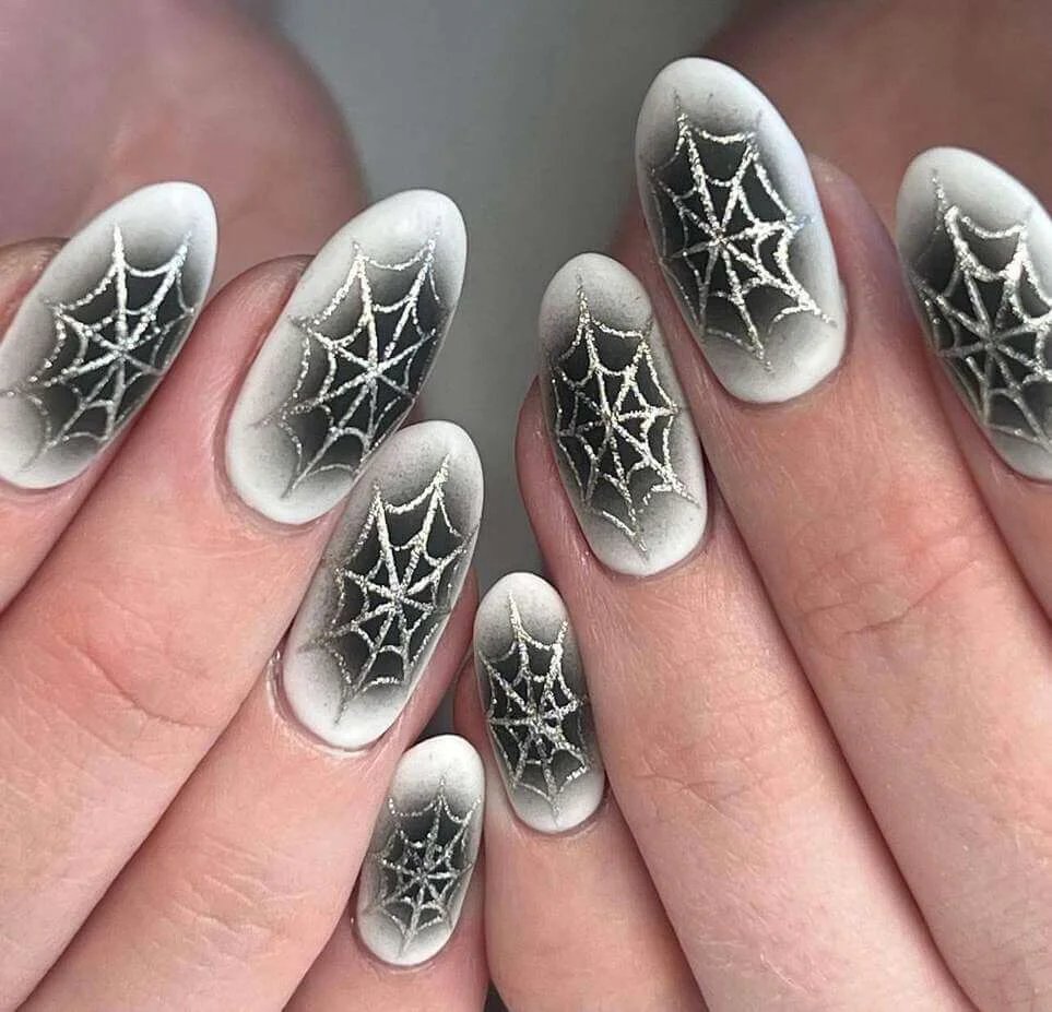 Silver spider web nails